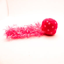 Load image into Gallery viewer, Pink colorful comet stuffed cat toy with feathery tail. Side view. 
