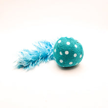 Load image into Gallery viewer, Blue colorful comet stuffed cat toy with feathery tail. Side view. 
