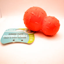 Load image into Gallery viewer, Side view of Diamond Plate Double-Tuff dog chew toy.  Toy is orange with two attached balls (looks like a snowman). Ball has texture and is connected to card tag. Displayed on white background.
