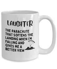 Load image into Gallery viewer, Laughter is a Parachute - It Softens the Landing Mug
